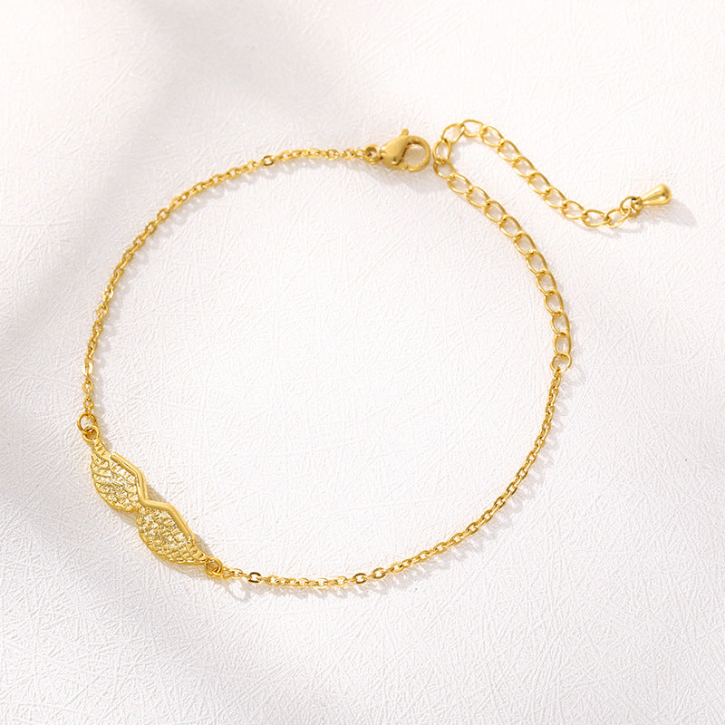 Celestial Gold Angel Wing Charm Bracelet | Elegant Women Accessory | Heavenly Skeleton Chain Design